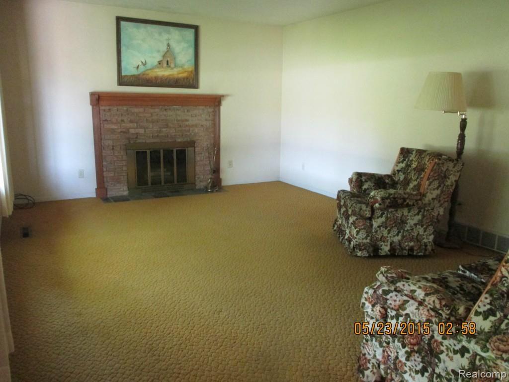 970 North Hintz Road Owosso, MI 48867 - Photo 5 of 11 Living room-Fireplace 1.jpg
