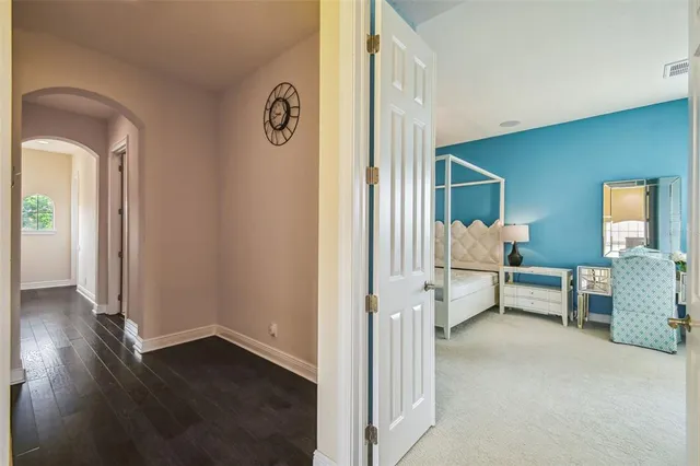 a kitchen with stainless steel appliances granite countertop a stove sink and cabinets