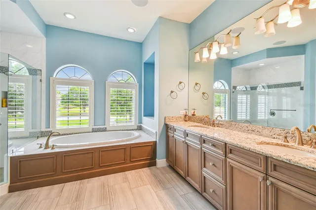 a view of a patio with a table chairs and a table