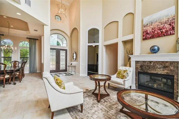 a view of a dining room with furniture window and outside view