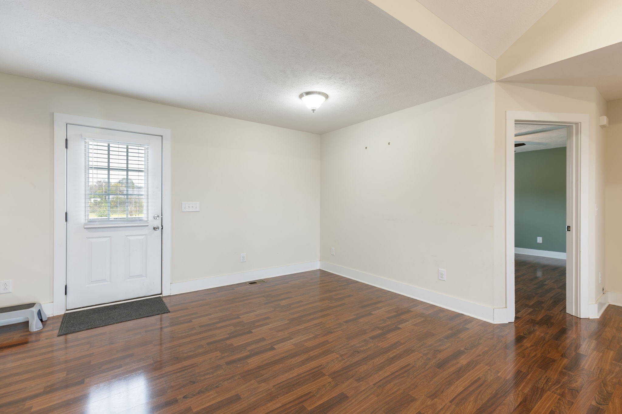 735 Belfast Farmington Road Lewisburg, TN 37091 - Photo 15 of 56 an empty room with wooden floor & closet area