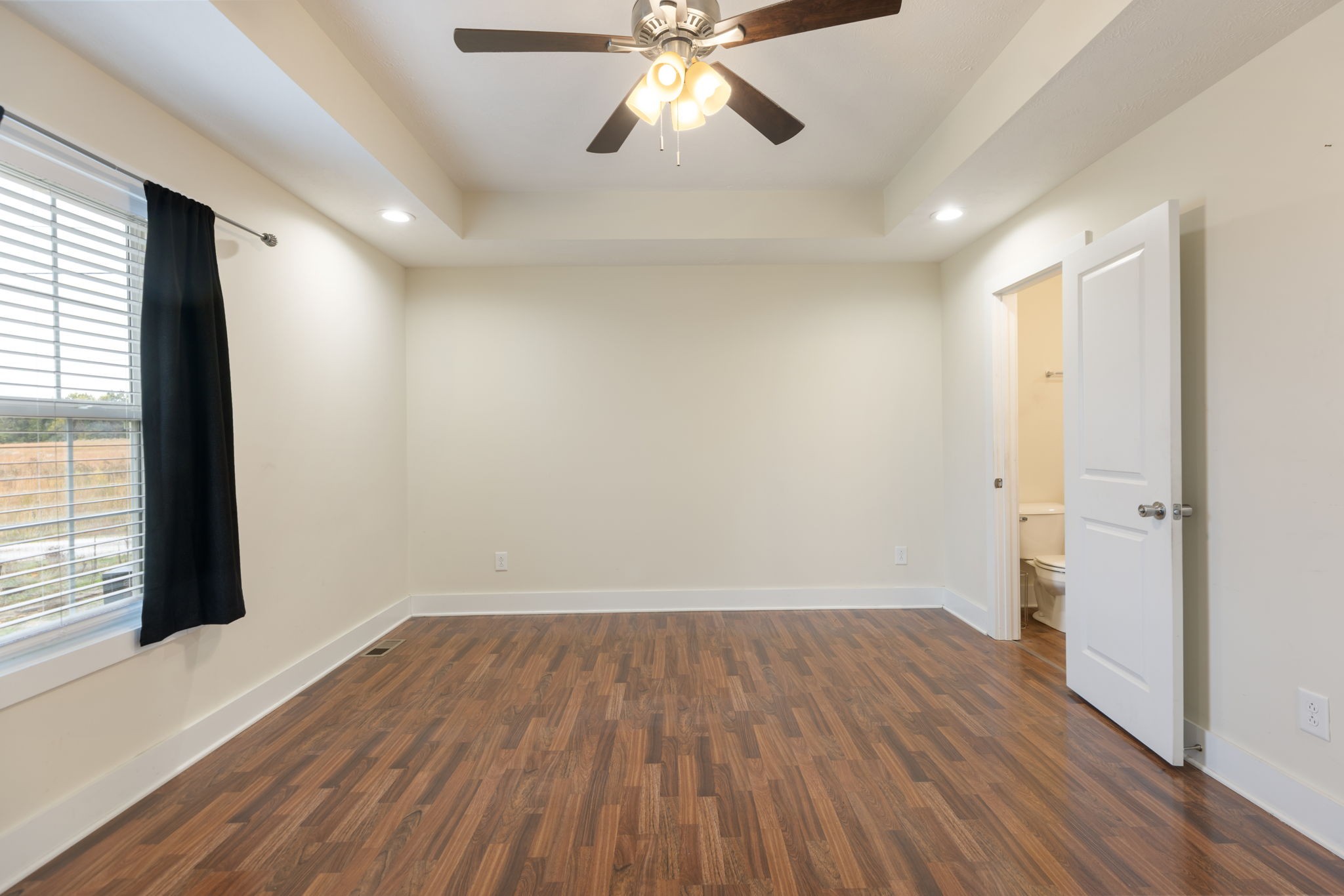 735 Belfast Farmington Road Lewisburg, TN 37091 - Photo 24 of 56 wooden floor in an empty room with a window