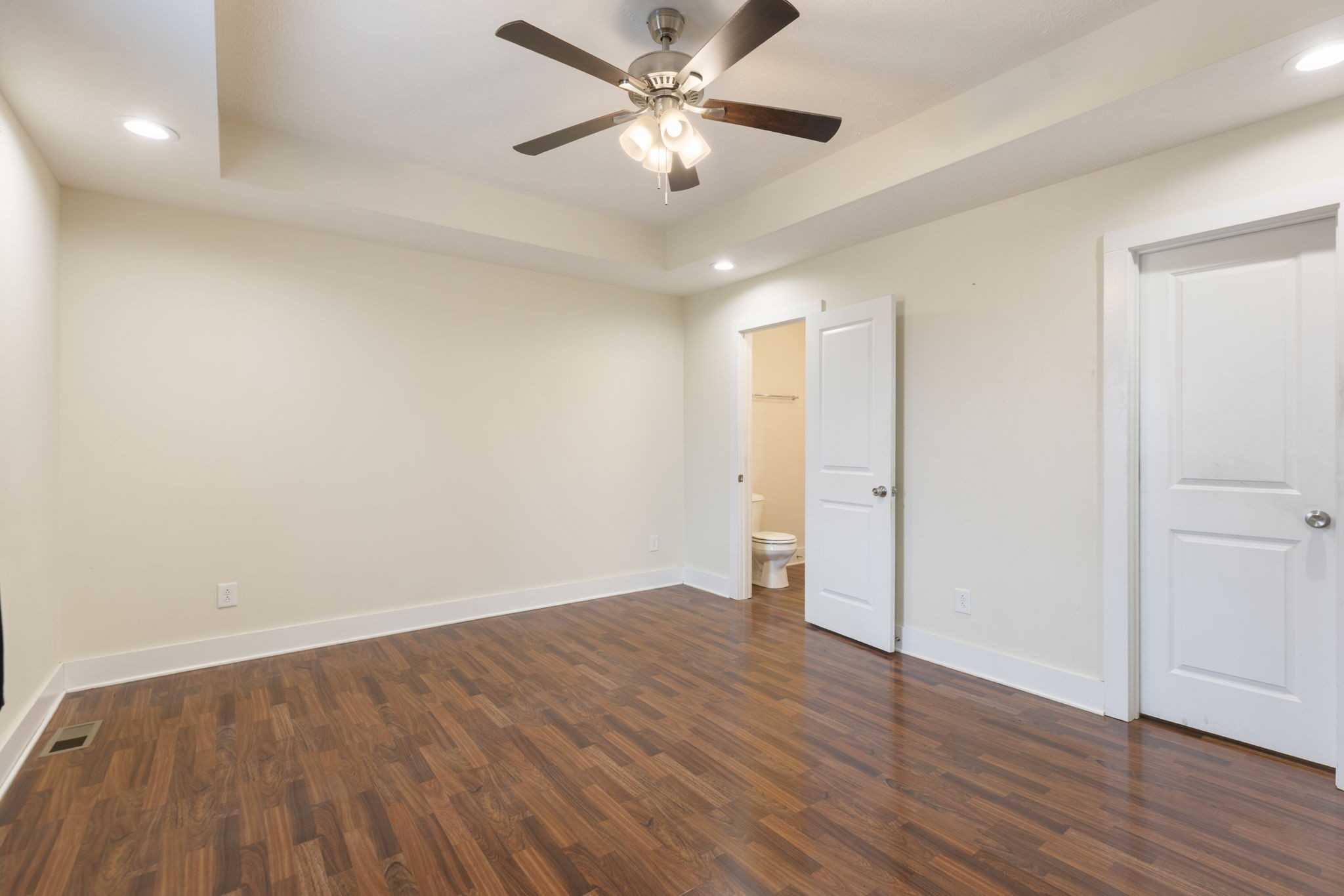 735 Belfast Farmington Road Lewisburg, TN 37091 - Photo 25 of 56 an empty room with wooden floor and a ceiling fan