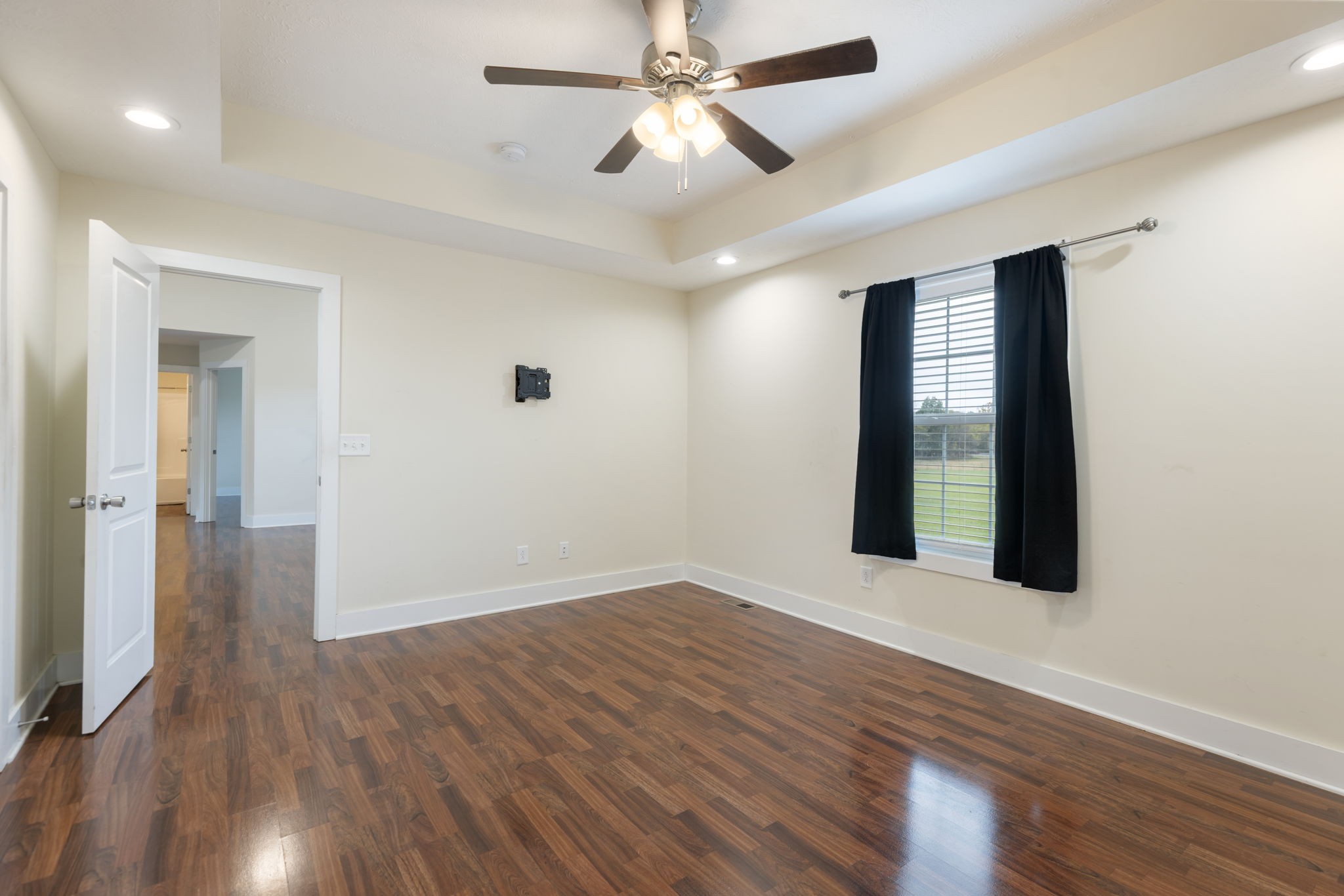 735 Belfast Farmington Road Lewisburg, TN 37091 - Photo 27 of 56 a view of an empty room with wooden floor and a window