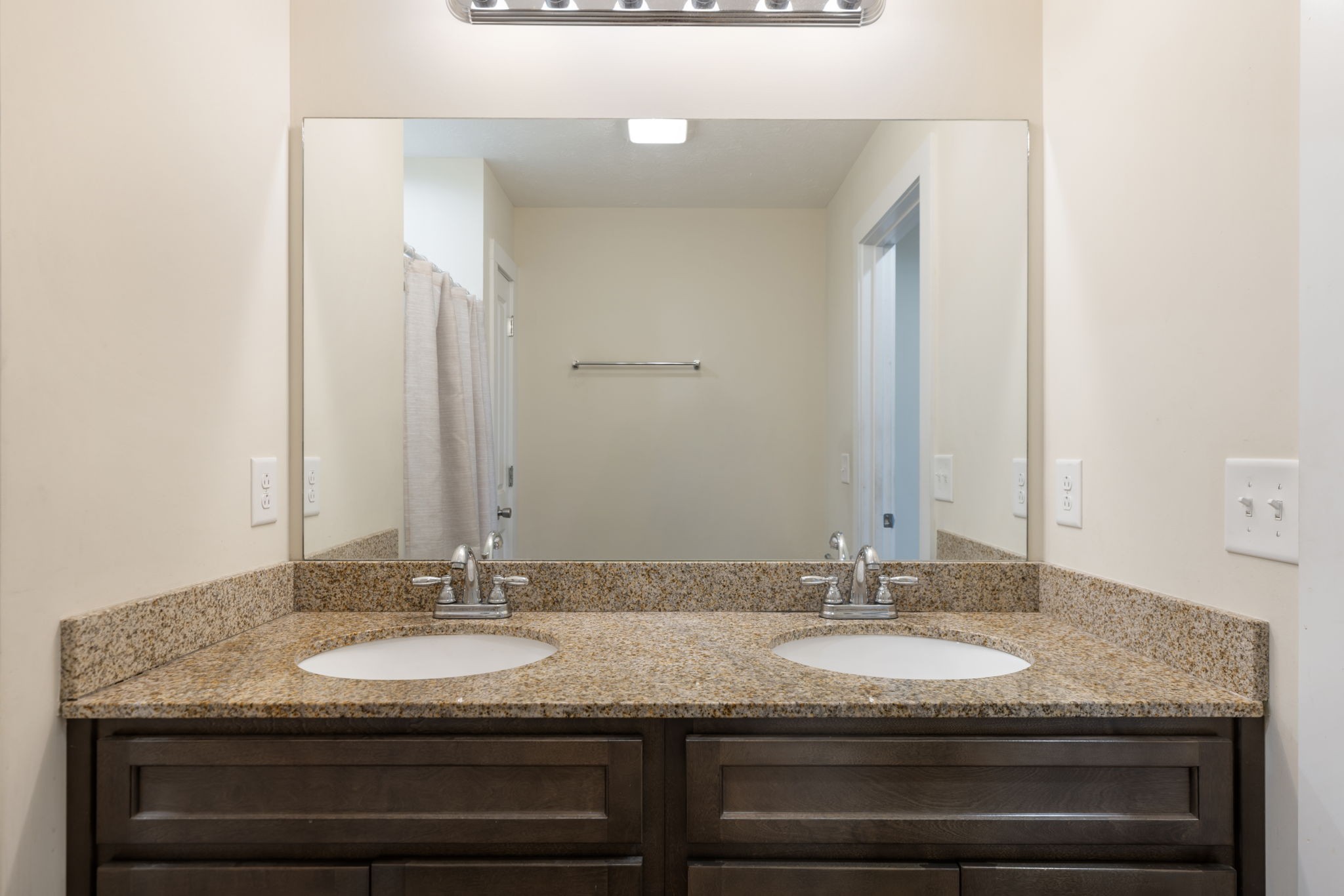 735 Belfast Farmington Road Lewisburg, TN 37091 - Photo 29 of 56 a bathroom with a granite countertop sink a mirror and vanity