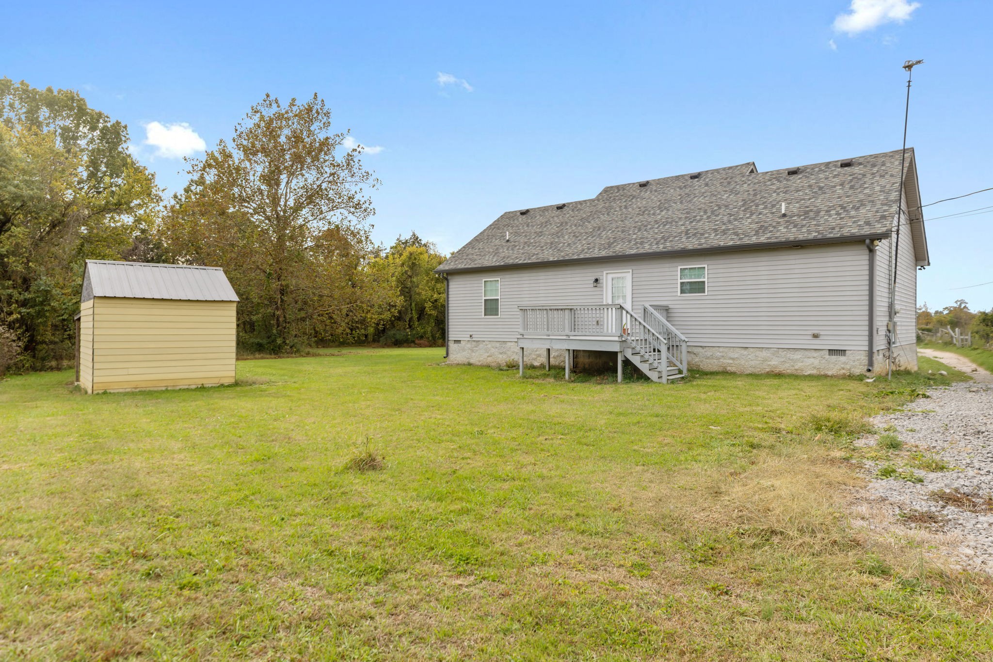 735 Belfast Farmington Road Lewisburg, TN 37091 - Photo 40 of 56 a view of a house with backyard and garden