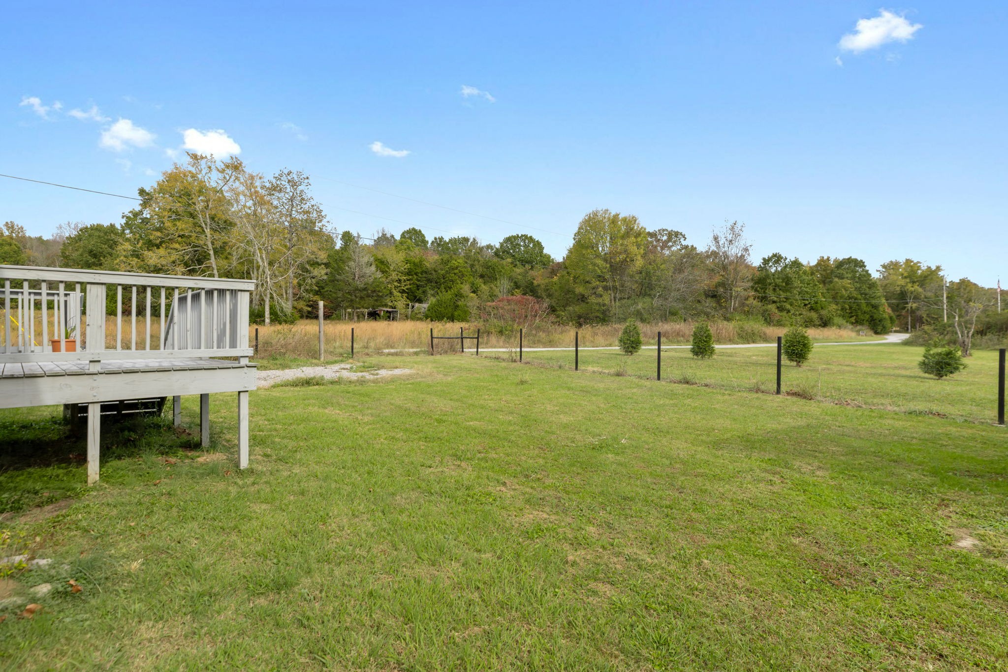 735 Belfast Farmington Road Lewisburg, TN 37091 - Photo 42 of 56 a view of lawn chairs and deck in backyard