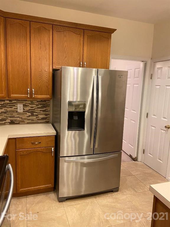 901 Cadogan Court Fort Mill, SC 29708 - Photo 12 of 33 a white refrigerator freezer sitting in a kitchen