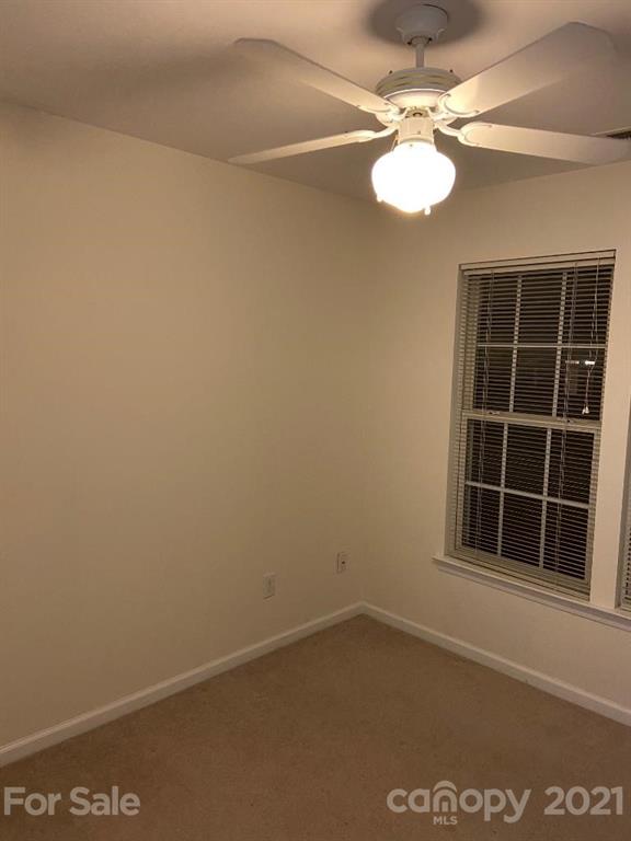 901 Cadogan Court Fort Mill, SC 29708 - Photo 19 of 33 a view of empty room with windows