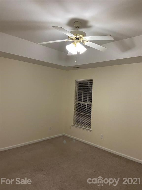 901 Cadogan Court Fort Mill, SC 29708 - Photo 21 of 33 an empty room with a window