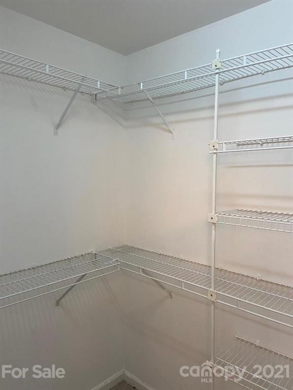 901 Cadogan Court Fort Mill, SC 29708 - Photo 23 of 33 a view of a room with racks on the wall