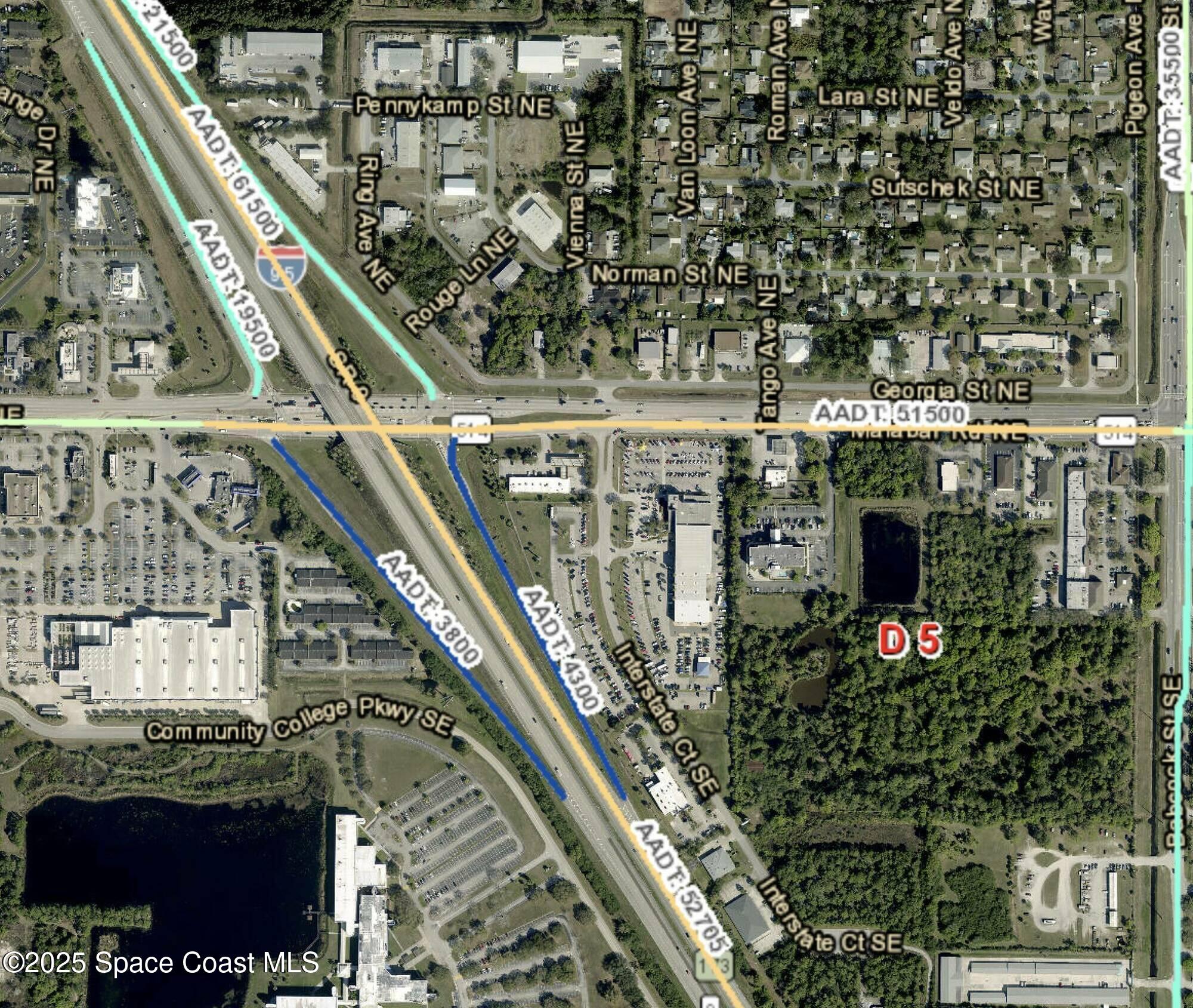 1240 Malabar Road Southeast Palm Bay, FL 32909 - Photo 2 of 3 a front view of a building with an outdoor space