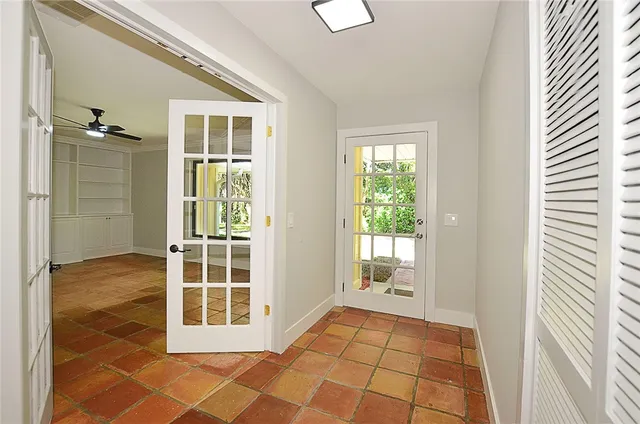 an empty room with windows