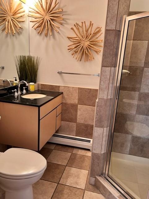 207 Forest Ridge Road Indiana, PA 15701 - Photo 18 of 25 a bathroom with a toilet and a shower