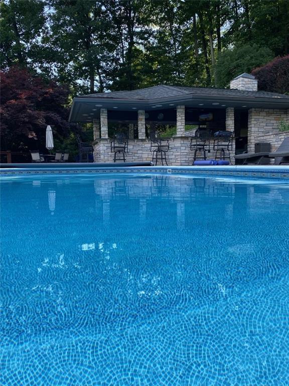 207 Forest Ridge Road Indiana, PA 15701 - Photo 21 of 25 a front view of house with yard and outdoor seating