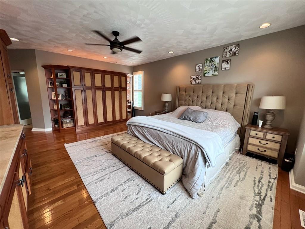 207 Forest Ridge Road Indiana, PA 15701 - Photo 8 of 25 a spacious bedroom with a bed a couch and a large window