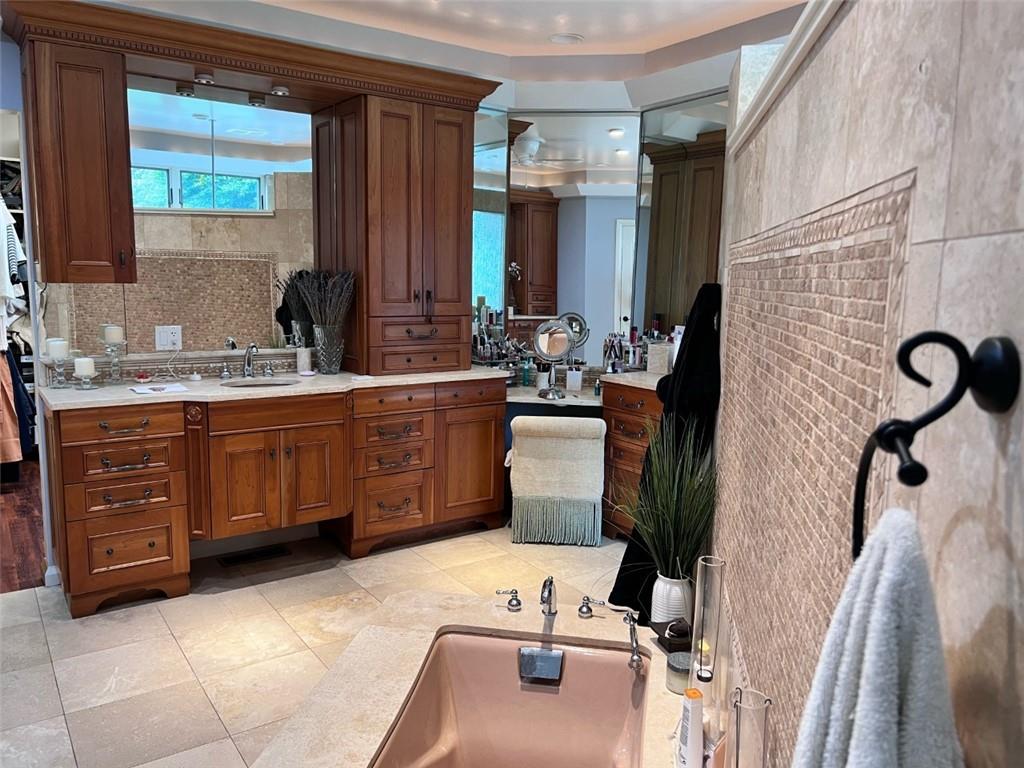 207 Forest Ridge Road Indiana, PA 15701 - Photo 9 of 25 a bathroom with a tub sink and mirror