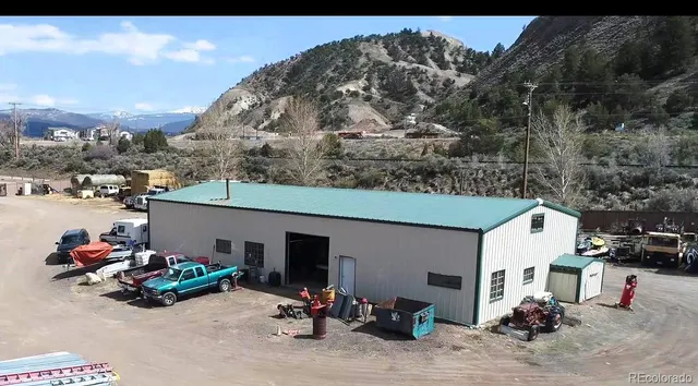 a view of a house with a big yard