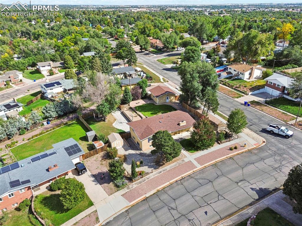 1305 Sunset Road Colorado Springs, CO 80909 - Photo 46 of 50 an aerial view of residential houses with outdoor space