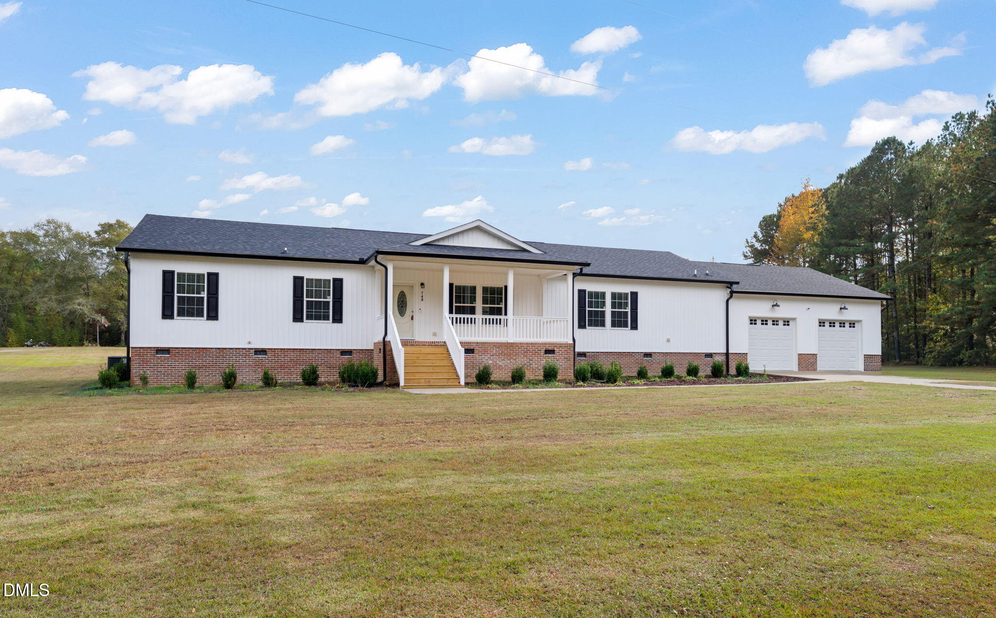 748 Gum Swamp Road Four Oaks, NC 27524 - Photo 1 of 43 a view of a house with a outdoor space