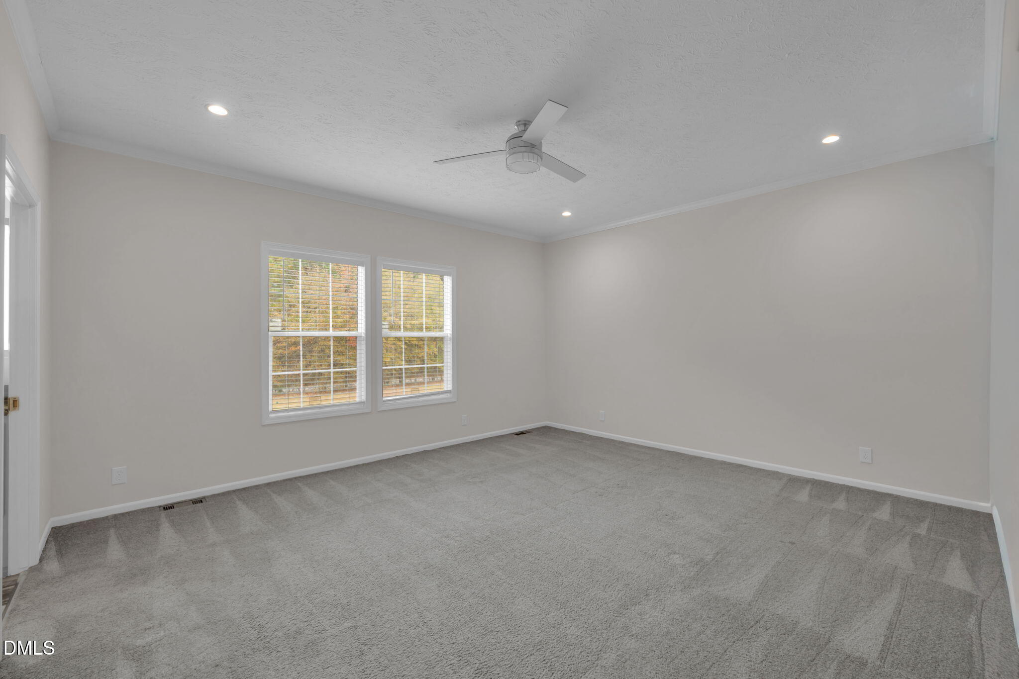 748 Gum Swamp Road Four Oaks, NC 27524 - Photo 16 of 43 an empty room with a window