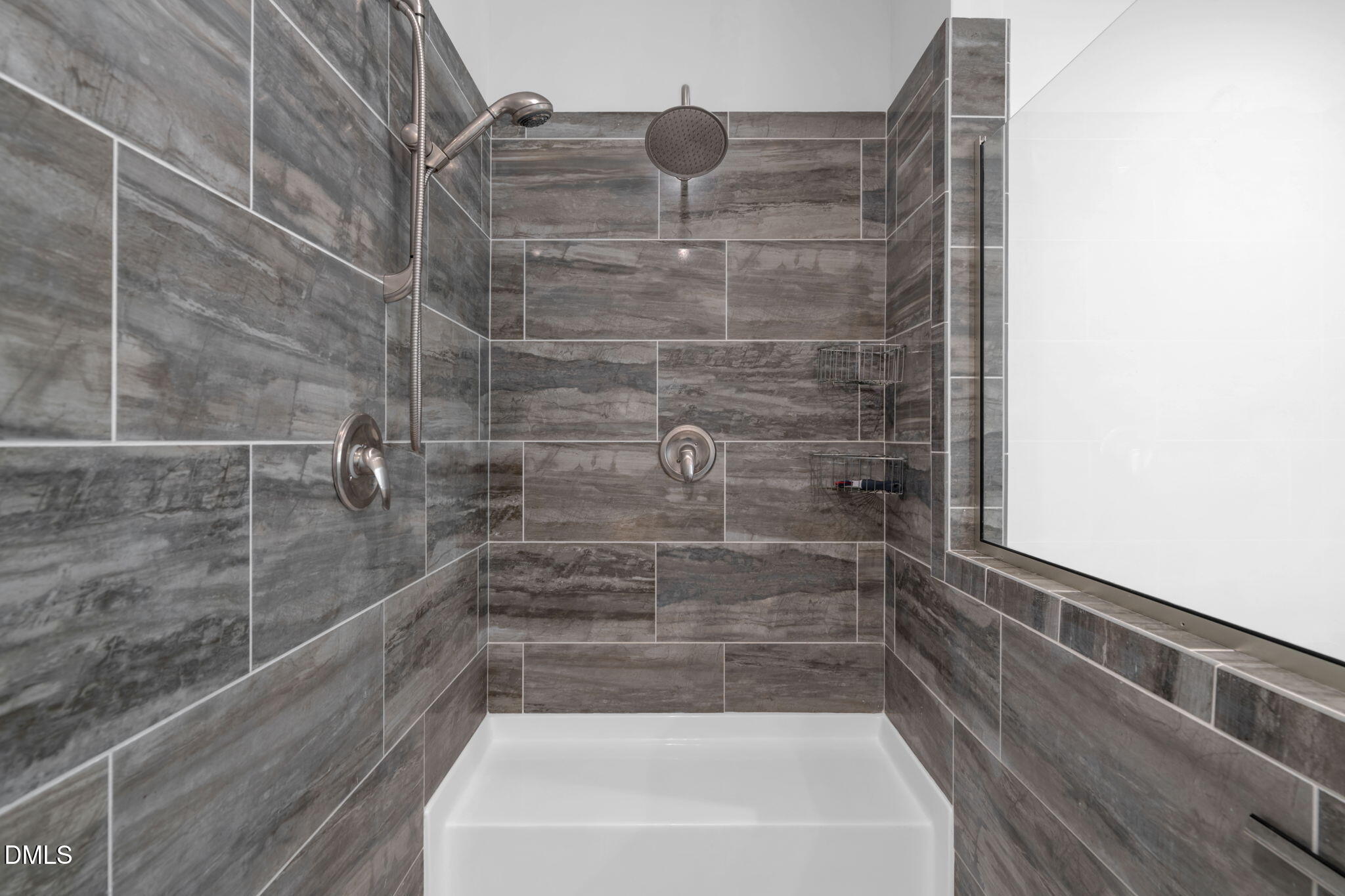 748 Gum Swamp Road Four Oaks, NC 27524 - Photo 20 of 43 a bathroom with a bathtub