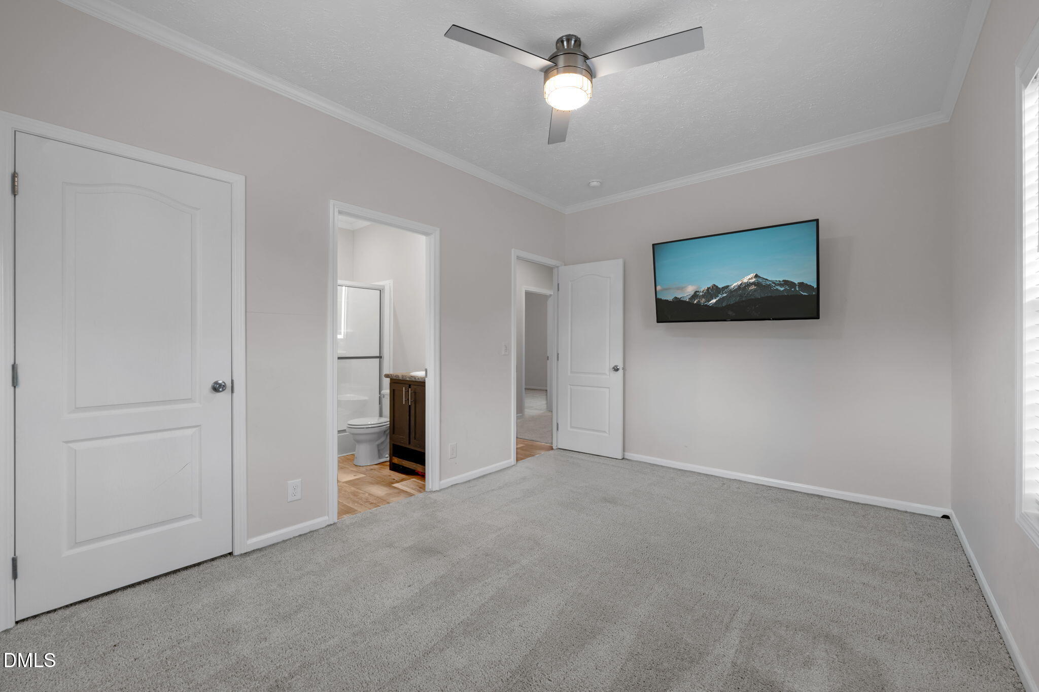 748 Gum Swamp Road Four Oaks, NC 27524 - Photo 22 of 43 a view of a livingroom with a flat screen tv