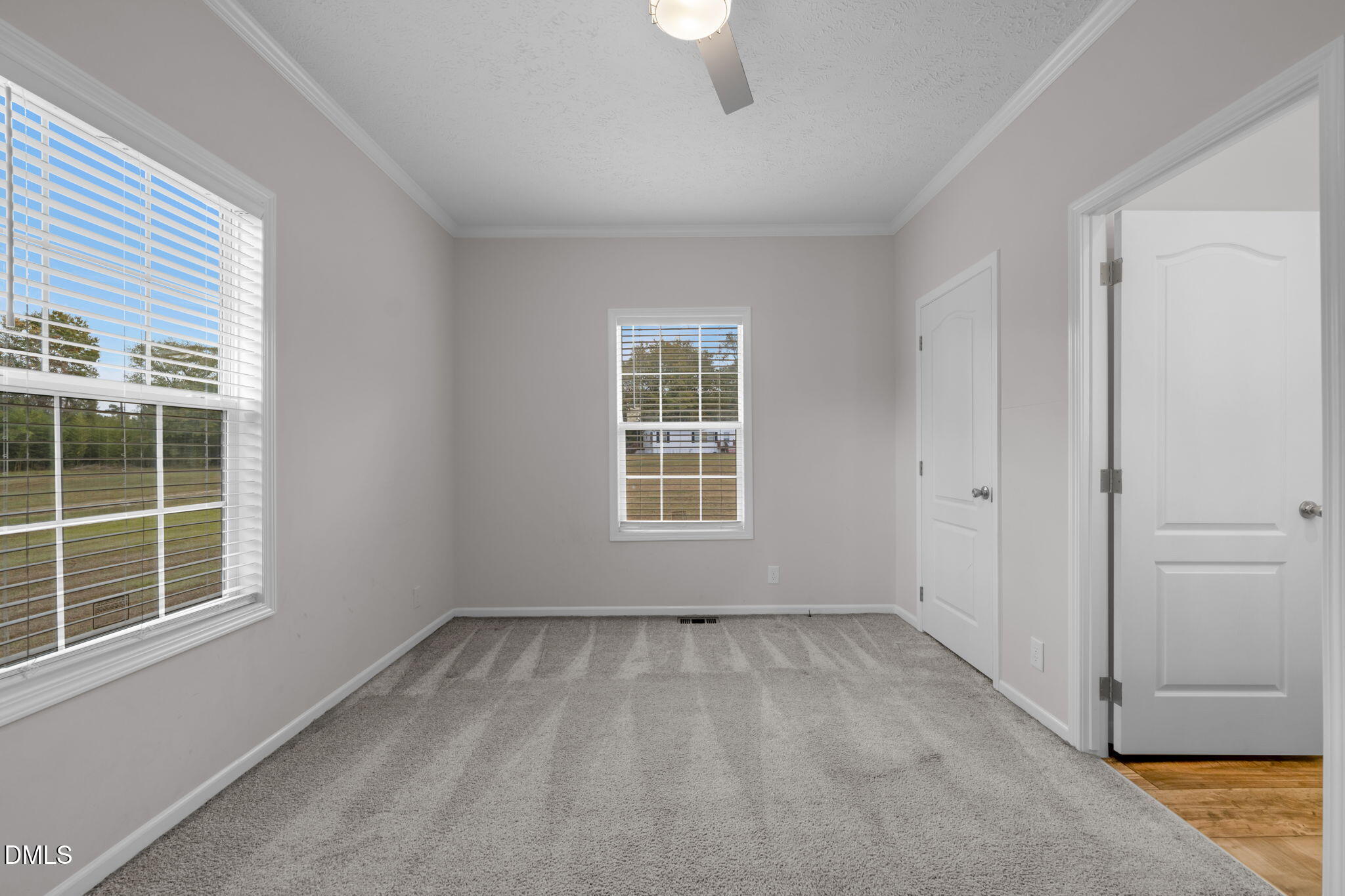 748 Gum Swamp Road Four Oaks, NC 27524 - Photo 23 of 43 a view of an empty room with a window