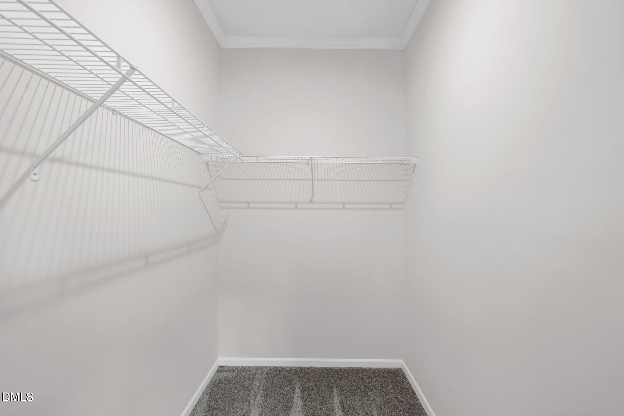 748 Gum Swamp Road Four Oaks, NC 27524 - Photo 24 of 43 a view of small space with racks on the wall