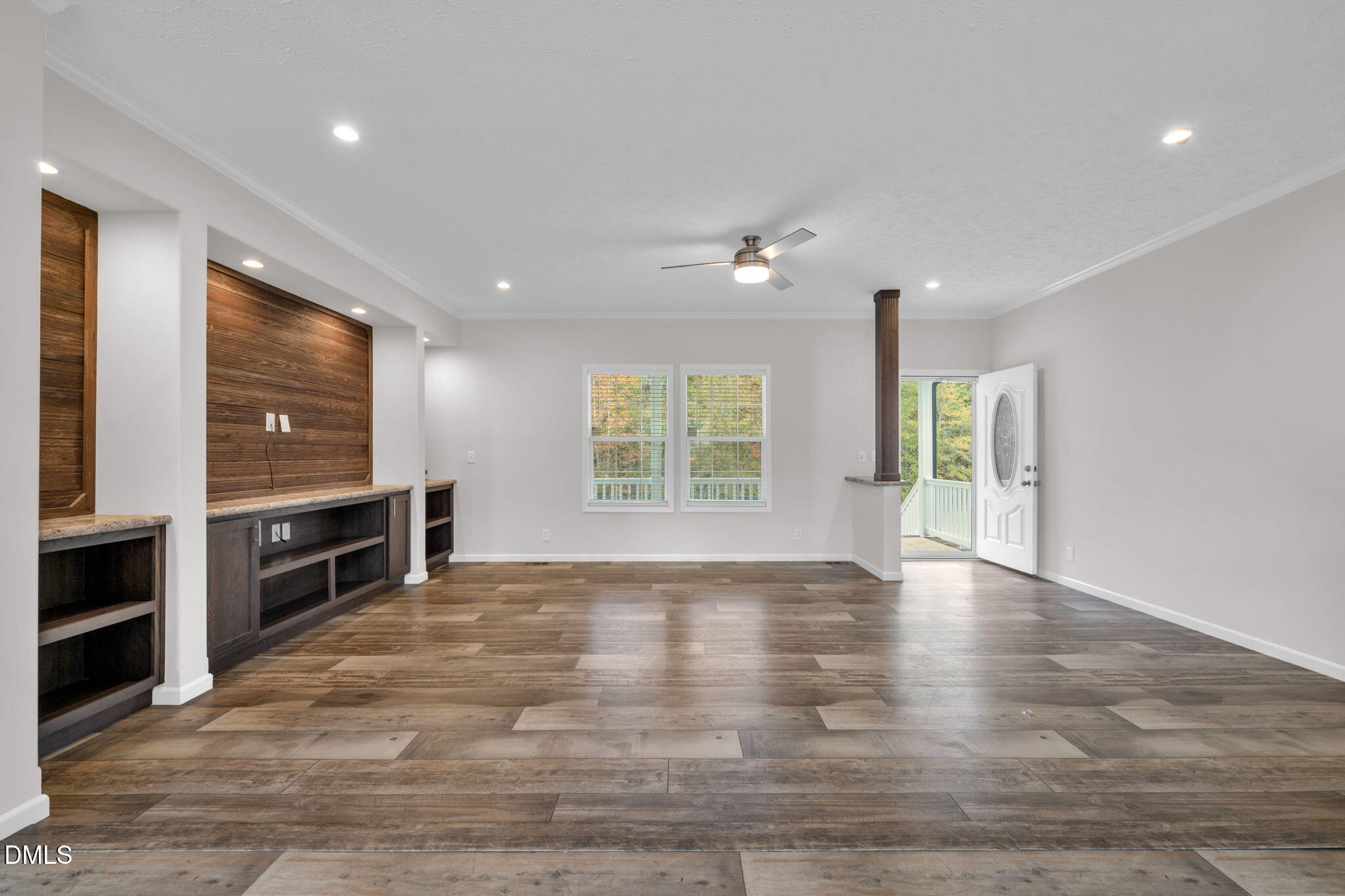 748 Gum Swamp Road Four Oaks, NC 27524 - Photo 3 of 43 a view of an empty room with a window and fireplace