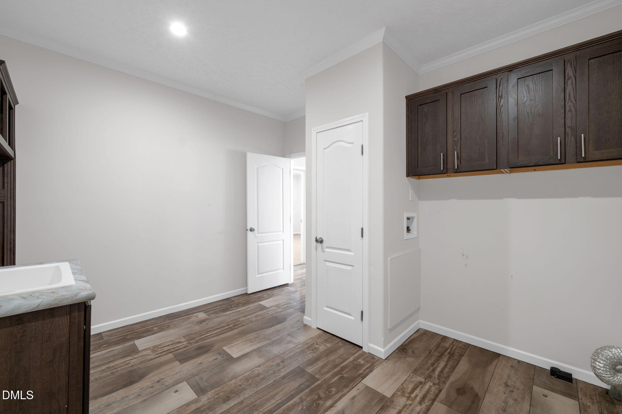 748 Gum Swamp Road Four Oaks, NC 27524 - Photo 31 of 43 a view of a kitchen with wooden floor