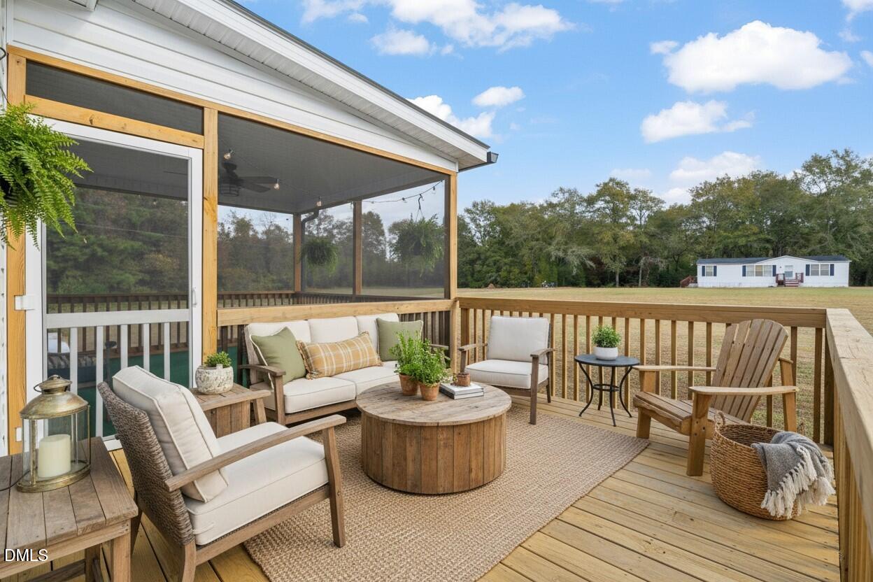 748 Gum Swamp Road Four Oaks, NC 27524 - Photo 34 of 43 a view of a patio on the roof deck