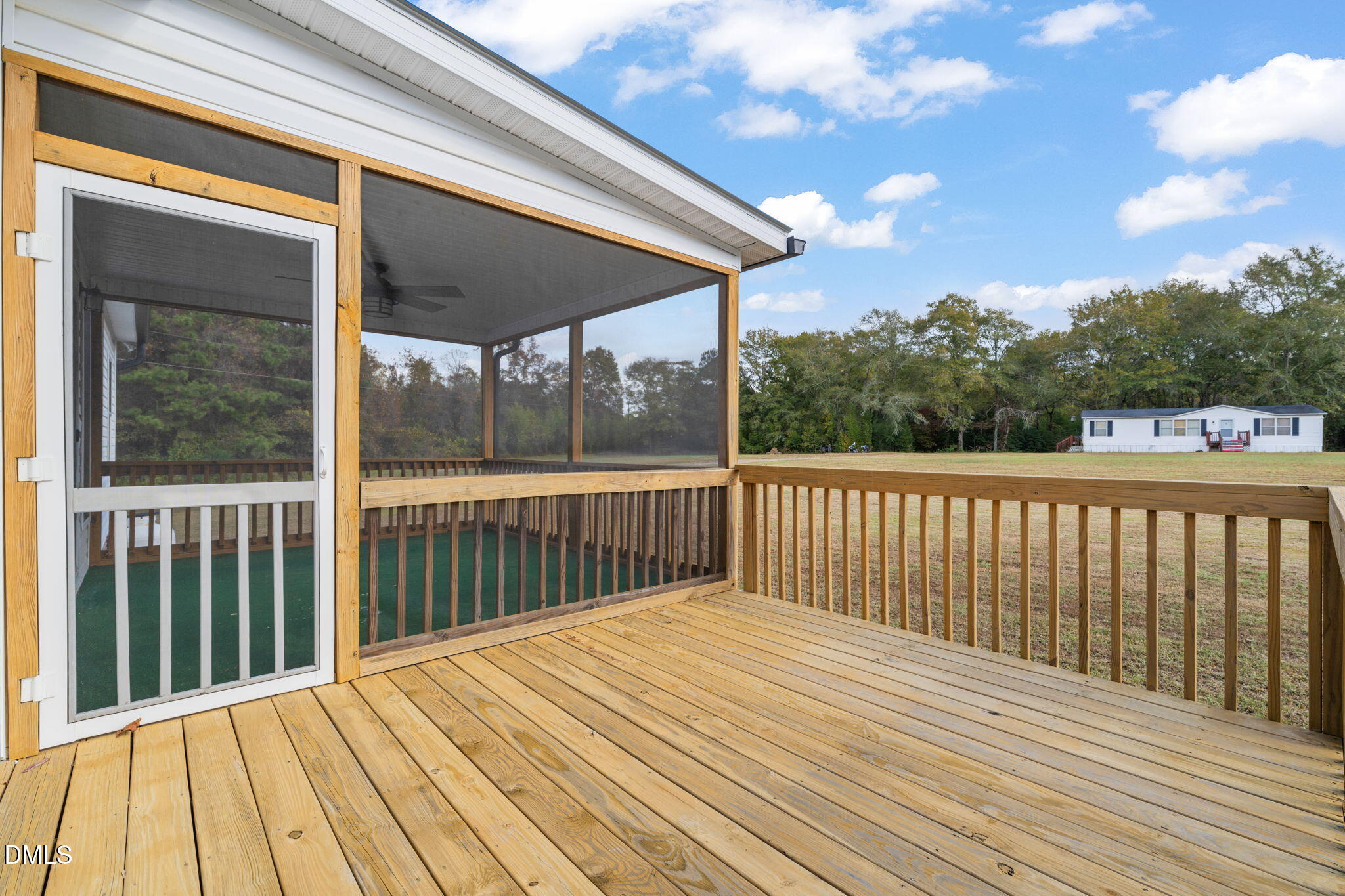 748 Gum Swamp Road Four Oaks, NC 27524 - Photo 35 of 43 a view of a wooden deck