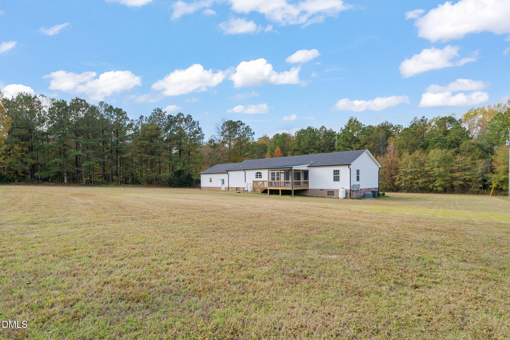 748 Gum Swamp Road Four Oaks, NC 27524 - Photo 40 of 43 a view of a house with a yard