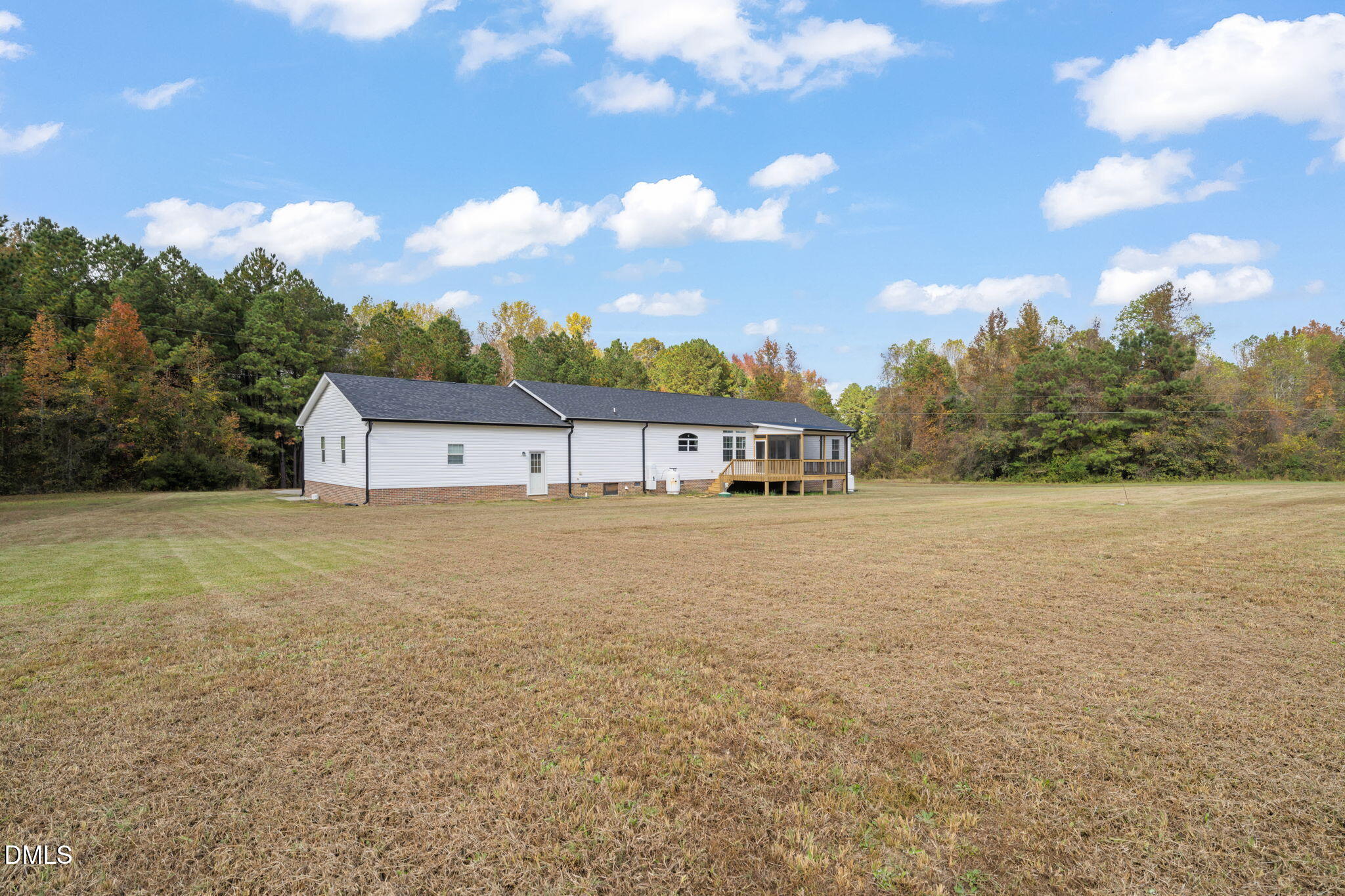 748 Gum Swamp Road Four Oaks, NC 27524 - Photo 41 of 43 a view of a house with a yard