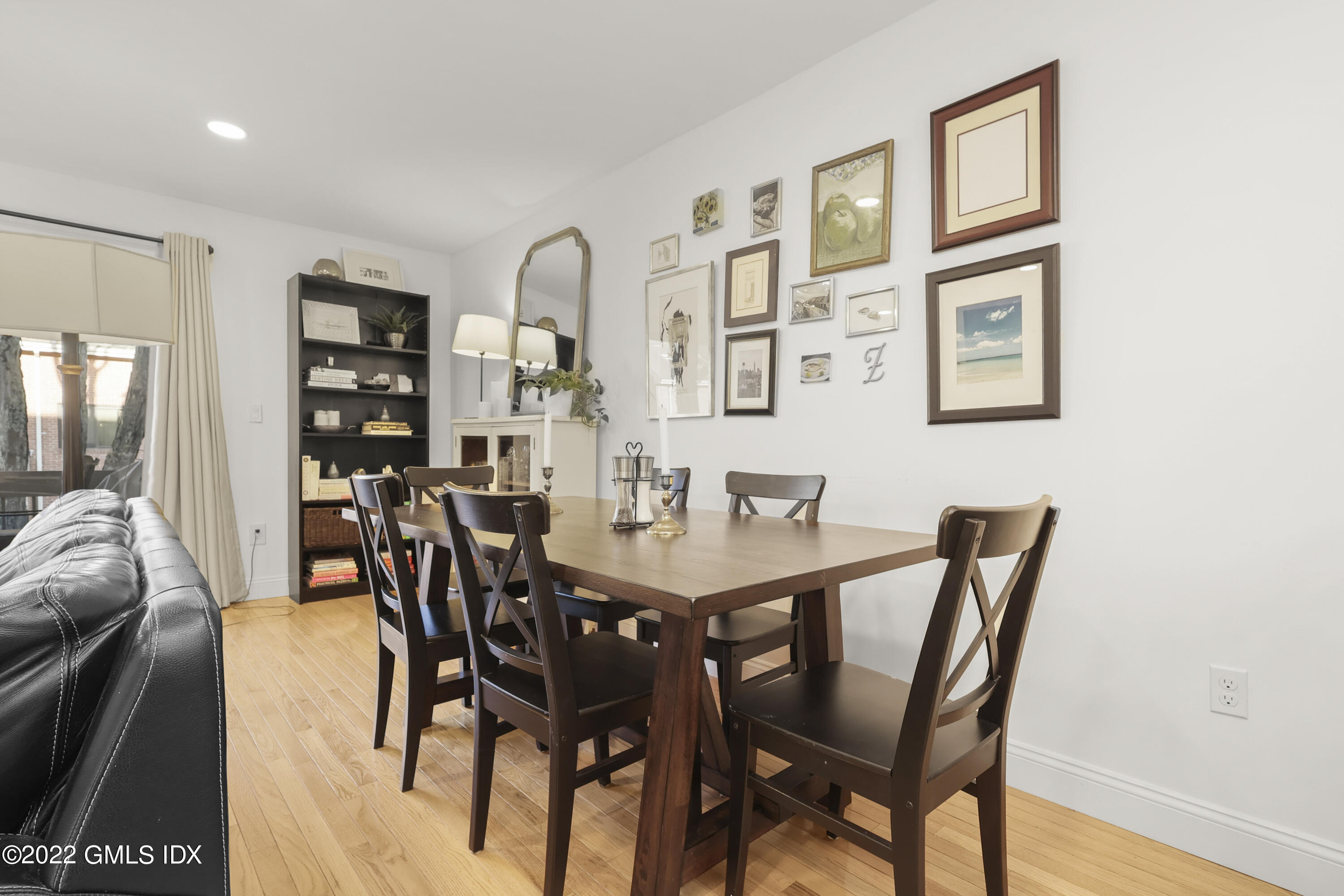 9 River Road, Unit 406 Cos Cob, CT 06807 - Photo 10 of 23 a view of a dining room with furniture