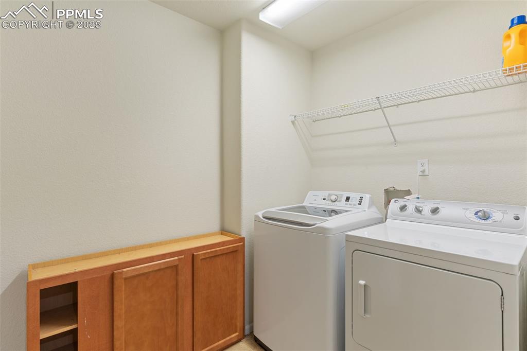 7644 Sandy Springs Point Fountain, CO 80817 - Photo 15 of 27 a utility room with dryer and washer