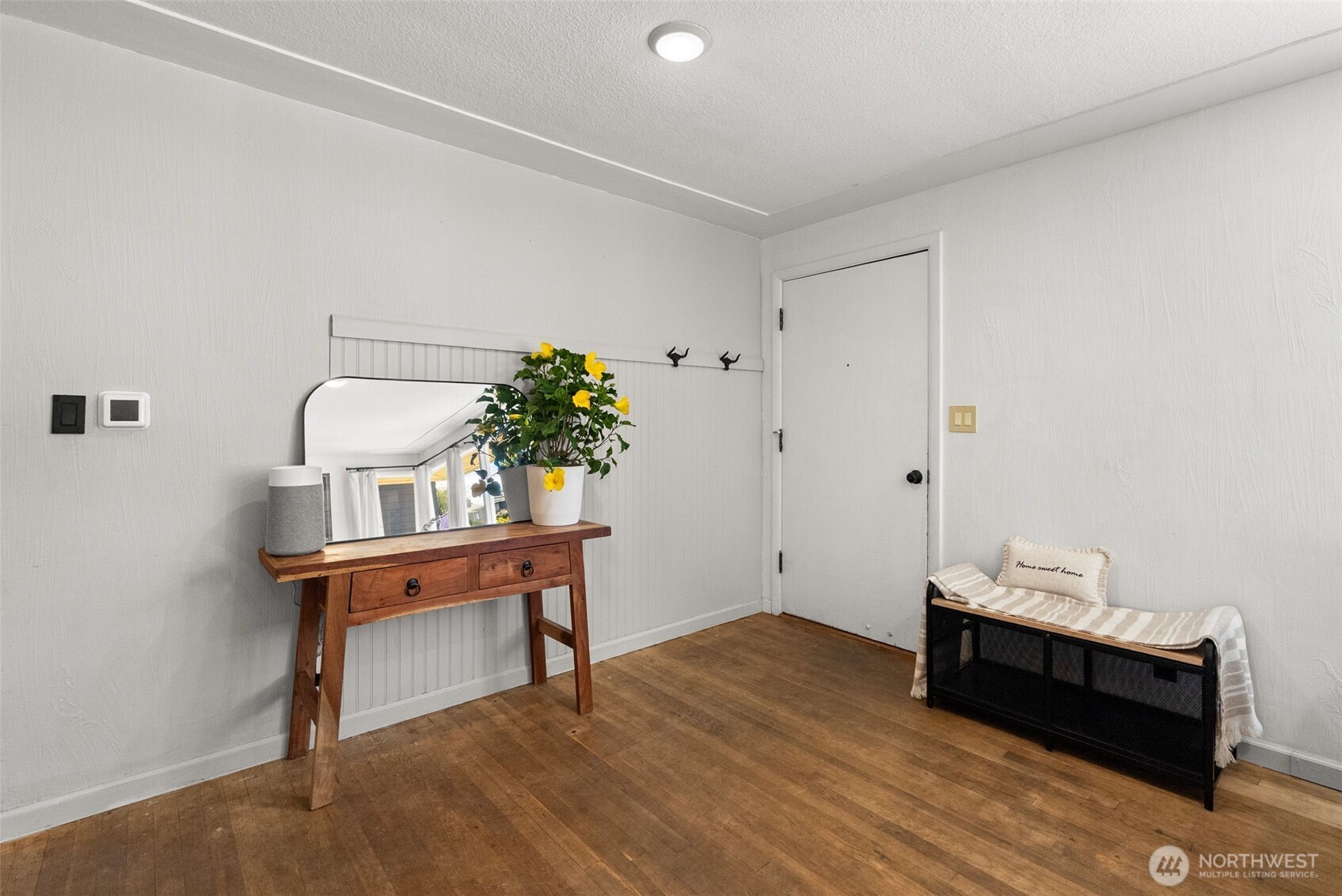 2710 Holman Street Bremerton, WA 98310 - Photo 4 of 25 a room with furniture and wooden floor