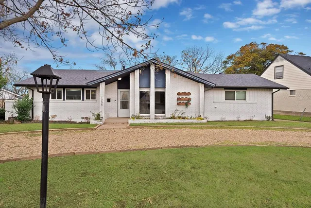a house view with a garden space