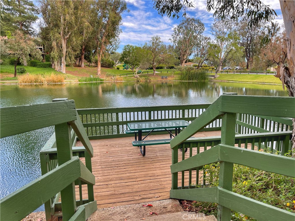 654 North Buttonbush Trail Orange, CA 92869 - Photo 16 of 23 a view of a wooden deck with lake