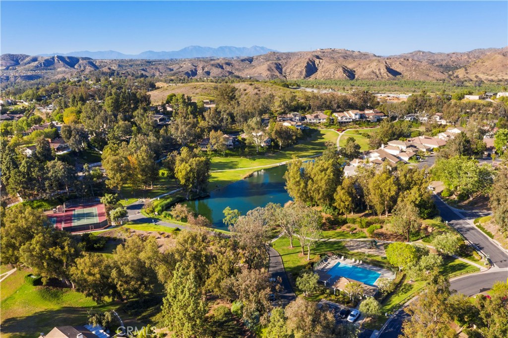 654 North Buttonbush Trail Orange, CA 92869 - Photo 3 of 23 a view of a city with mountains in the background