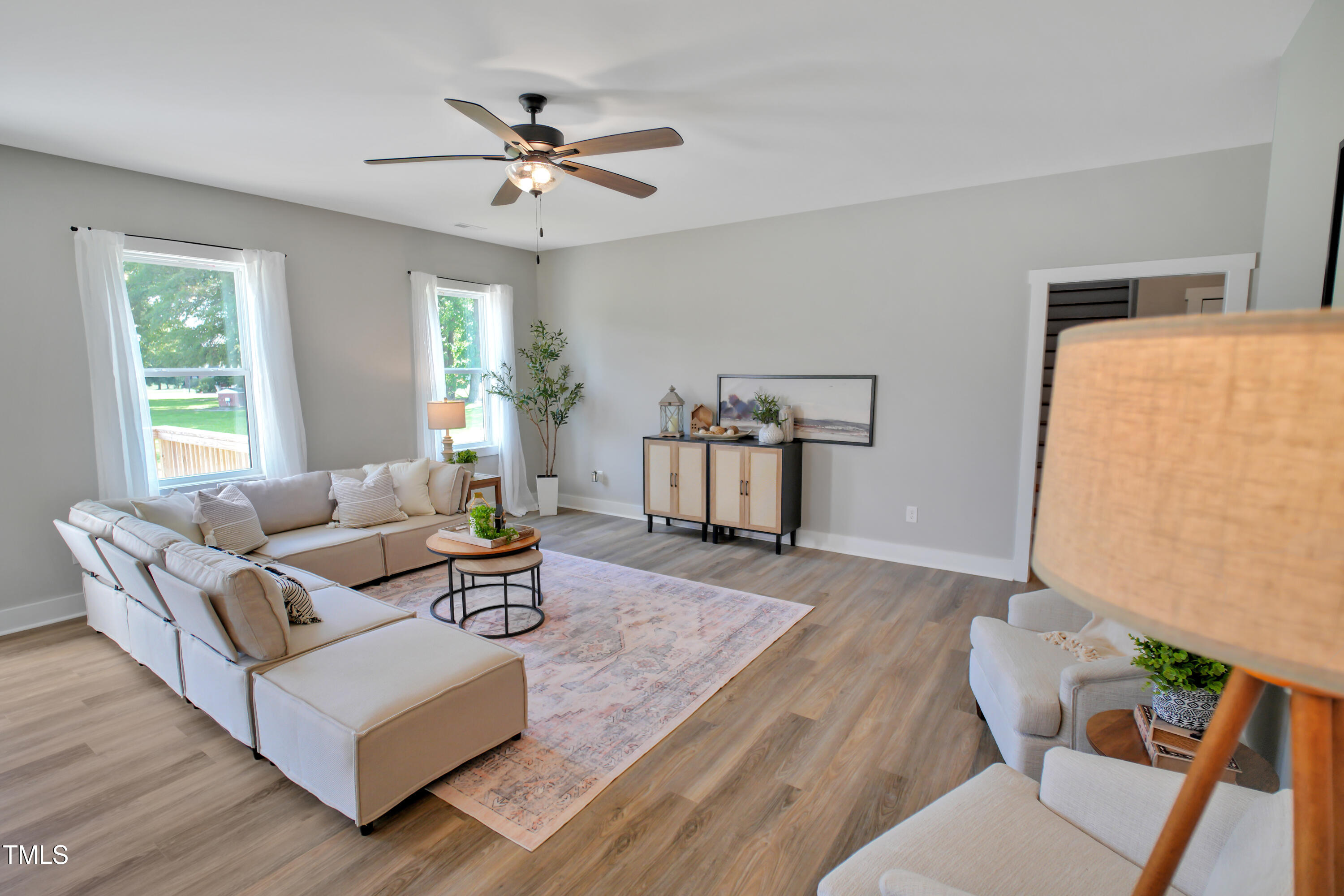 101 Sand Trap Lane Clinton, NC 28328 - Photo 20 of 49 a living room with furniture and white walls