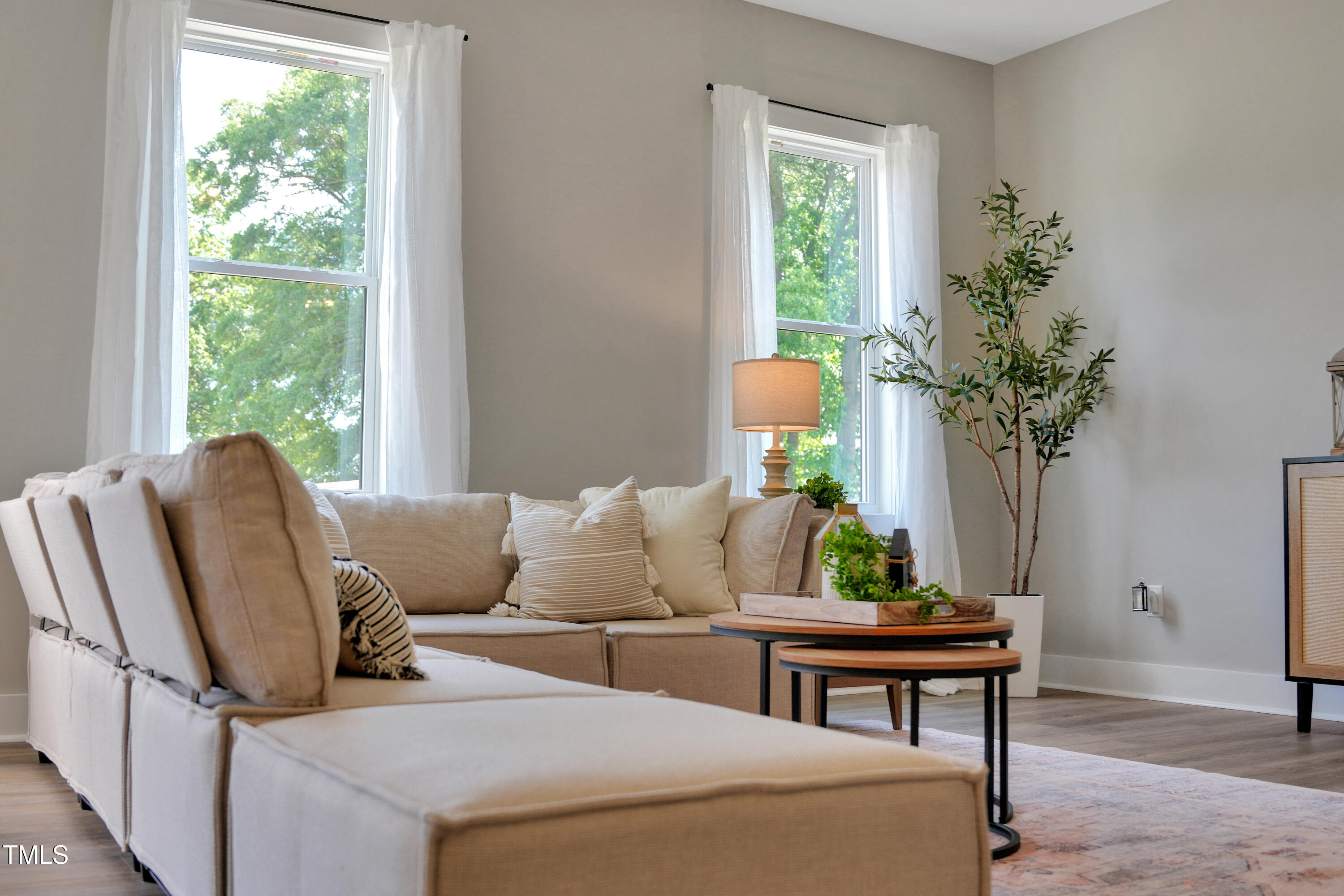 101 Sand Trap Lane Clinton, NC 28328 - Photo 22 of 49 a living room with furniture and a potted plant