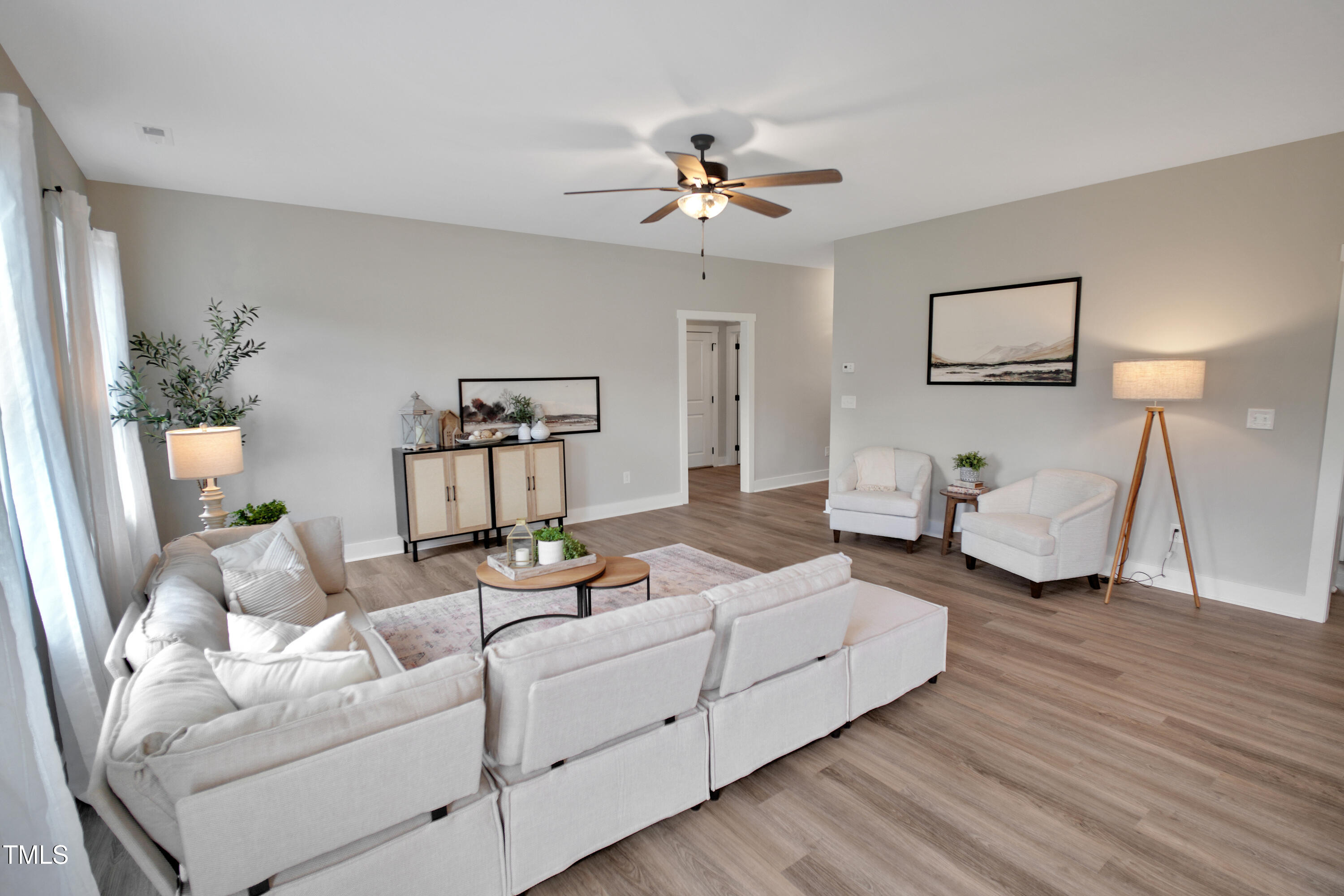 101 Sand Trap Lane Clinton, NC 28328 - Photo 25 of 49 a living room with furniture and a lamp