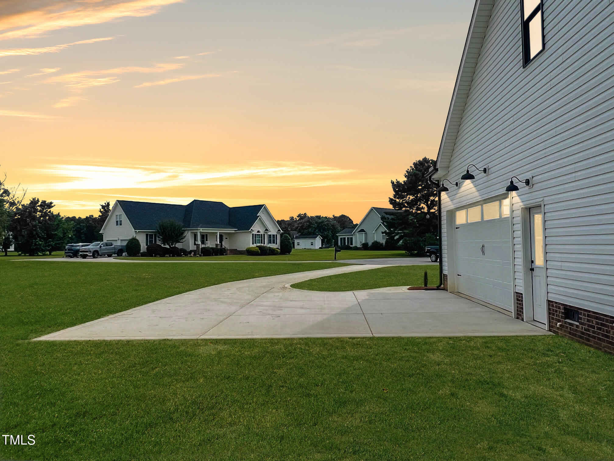 101 Sand Trap Lane Clinton, NC 28328 - Photo 3 of 49 a view of a house with a yard