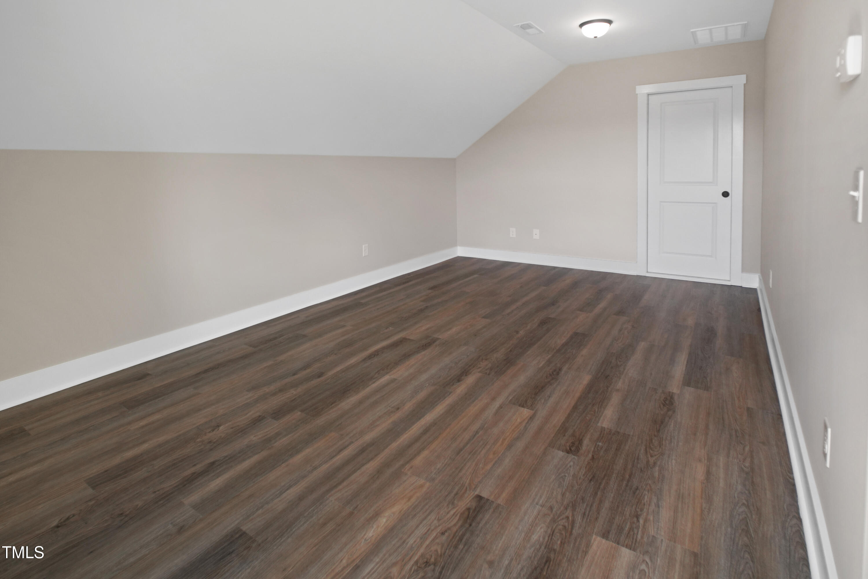 101 Sand Trap Lane Clinton, NC 28328 - Photo 38 of 49 a view of an empty room with wooden floor