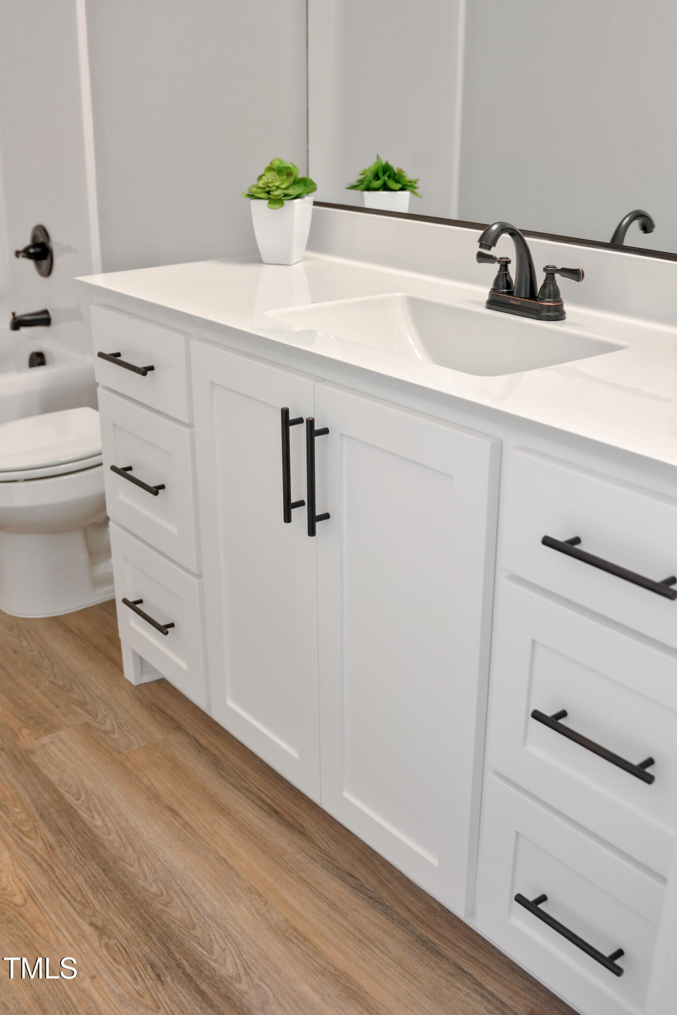 101 Sand Trap Lane Clinton, NC 28328 - Photo 43 of 49 a bathroom with a sink and a mirror