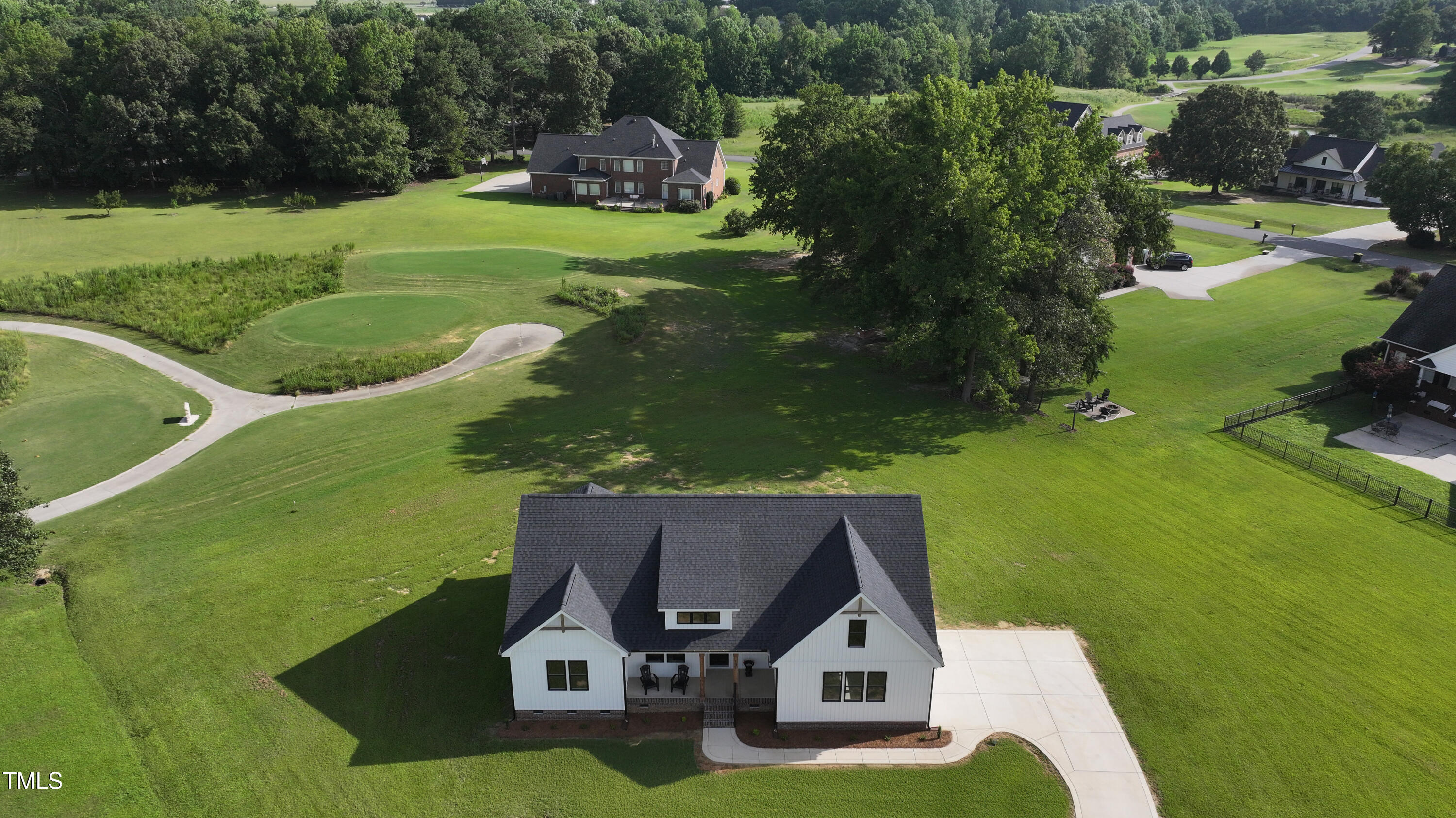101 Sand Trap Lane Clinton, NC 28328 - Photo 46 of 49 an aerial view of a house with a yard