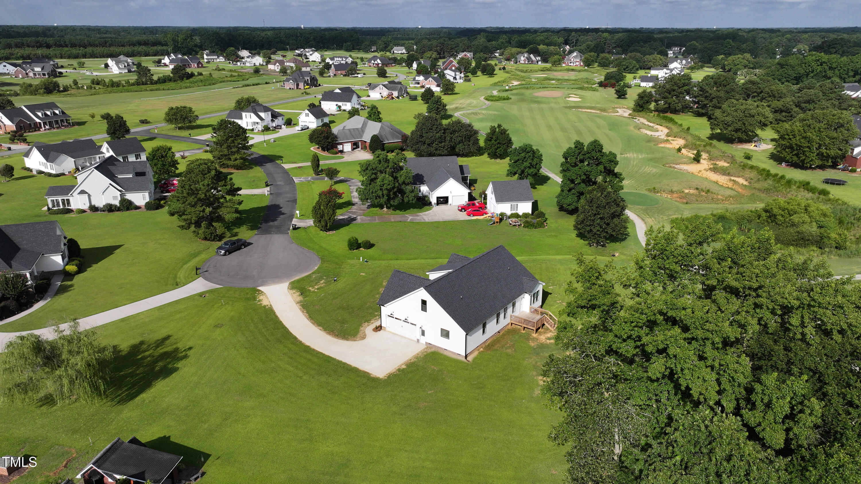 101 Sand Trap Lane Clinton, NC 28328 - Photo 9 of 49 an aerial view of a residential houses with outdoor space and street view