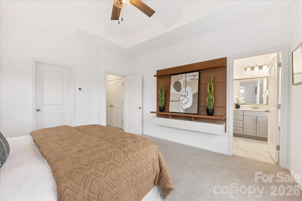 9205 Bluefield Street Charlotte, NC 28273 - Photo 28 of 48 a view of a bedroom with furniture and window